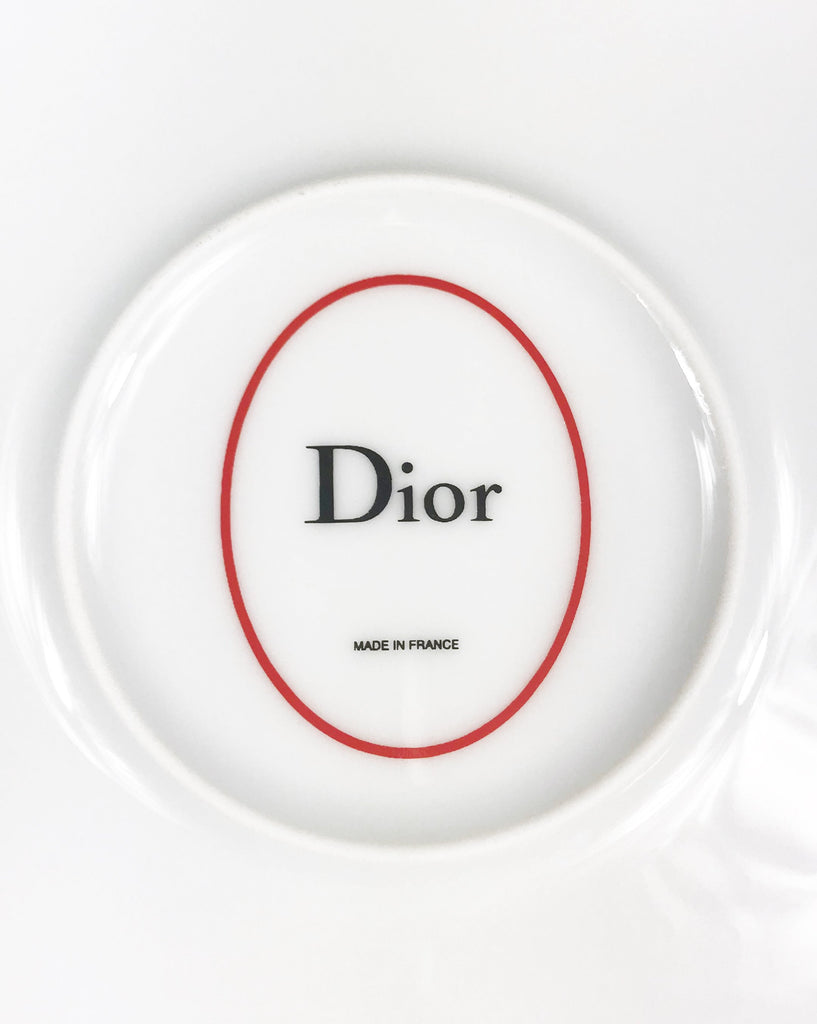 FRUIT Vintage Christian Dior J'adore Dior porcelain plate set. They feature an iconic newspaper cut-out version of the Jadore Dior logo monogram print in black, white and gold.