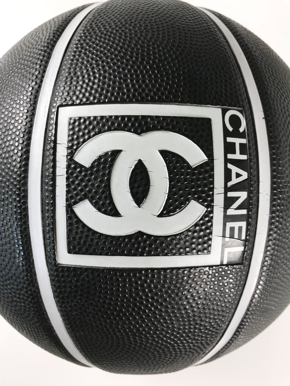 Fruit Vintage rare Chanel 2004 Basketball. This Chanel sport logo ball by Karl Lagerfeld is an important Chanel collectors accessory. It features a large Chanel logo and text on both sides in high contrast grey/black tone. Perfect for use as a home decor feature, this ball is piece of Chanel history!