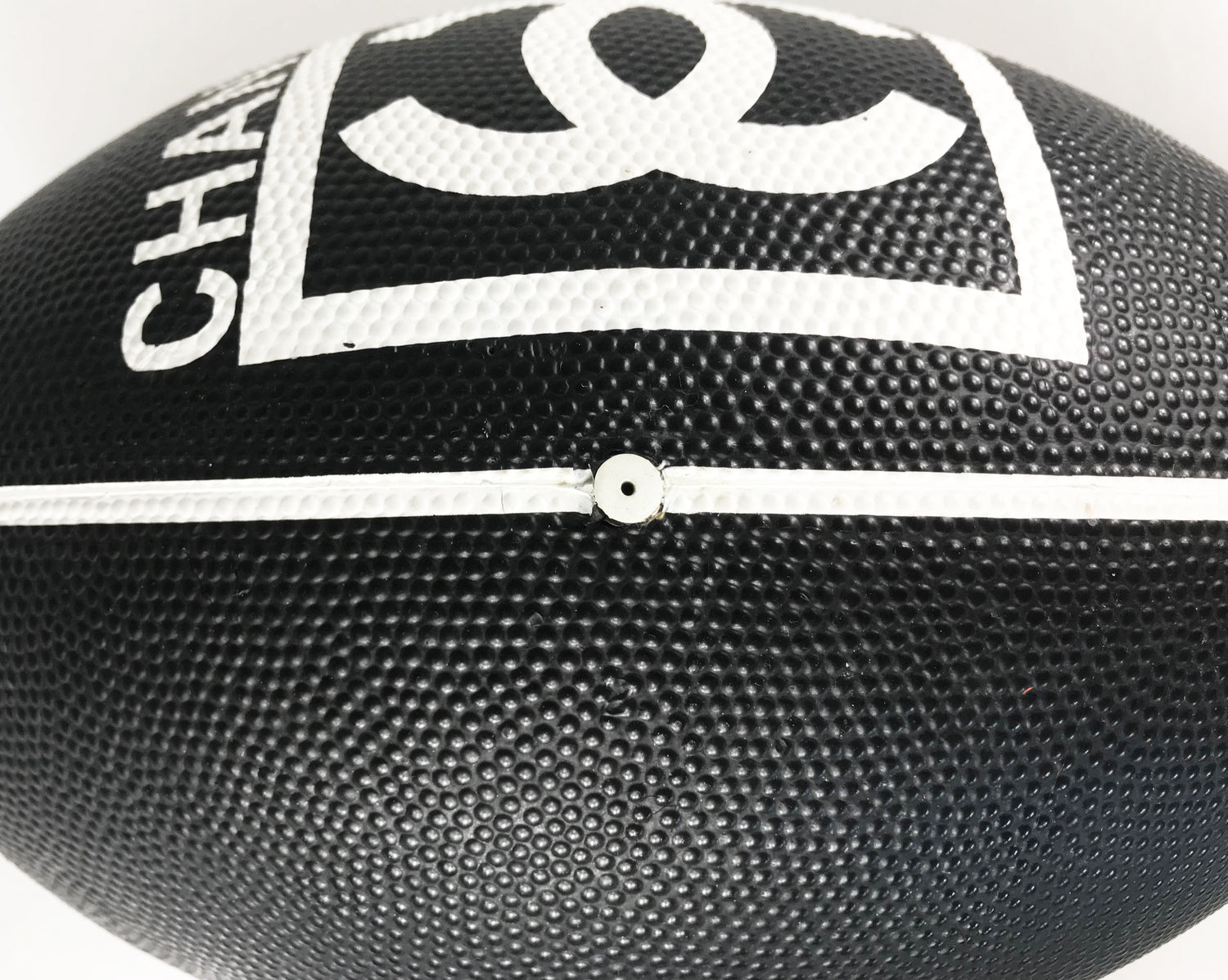 Fruit Vintage rare Chanel 2007 football. This Chanel sport logo foot ball by Karl Lagerfeld is an important Chanel collectors accessory. It features a large Chanel logo and text in black and white