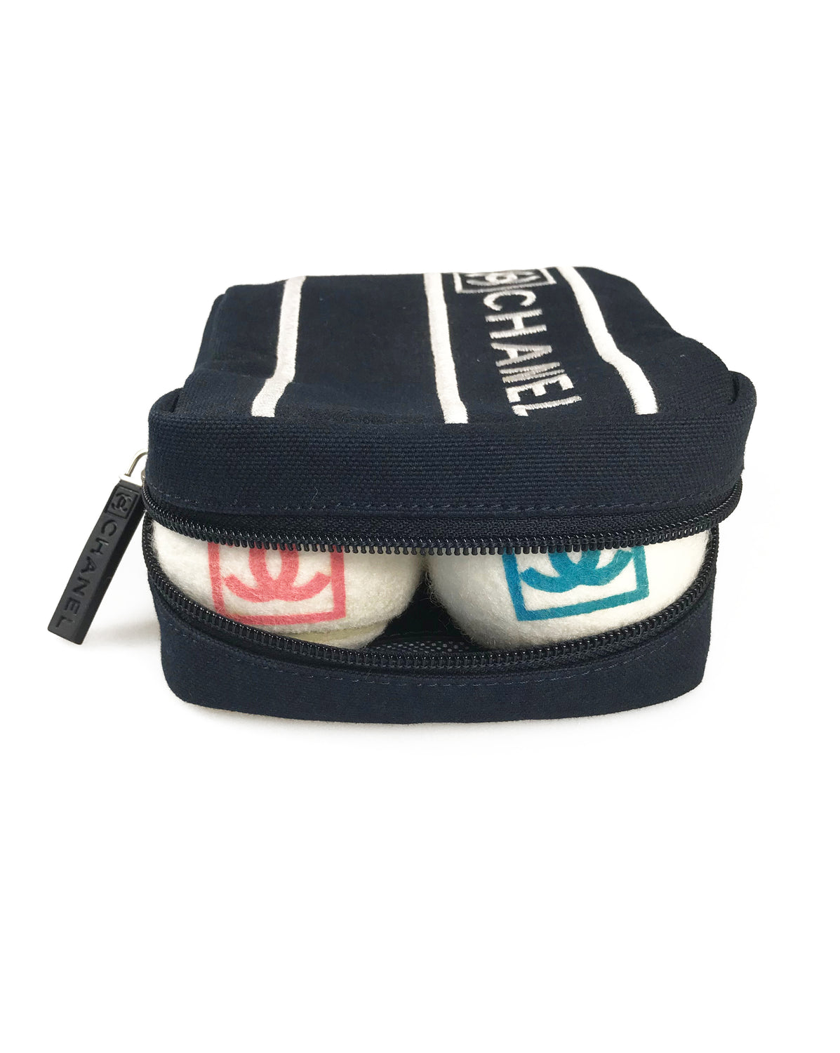 Fruit Vintage Chanel tennis ball set - a rare and important Chanel collectors accessory. It features a 4 Chanel tennis balls (2 pink and 2 blue) in a navy zipper accessory pouch with logo embroidery. 