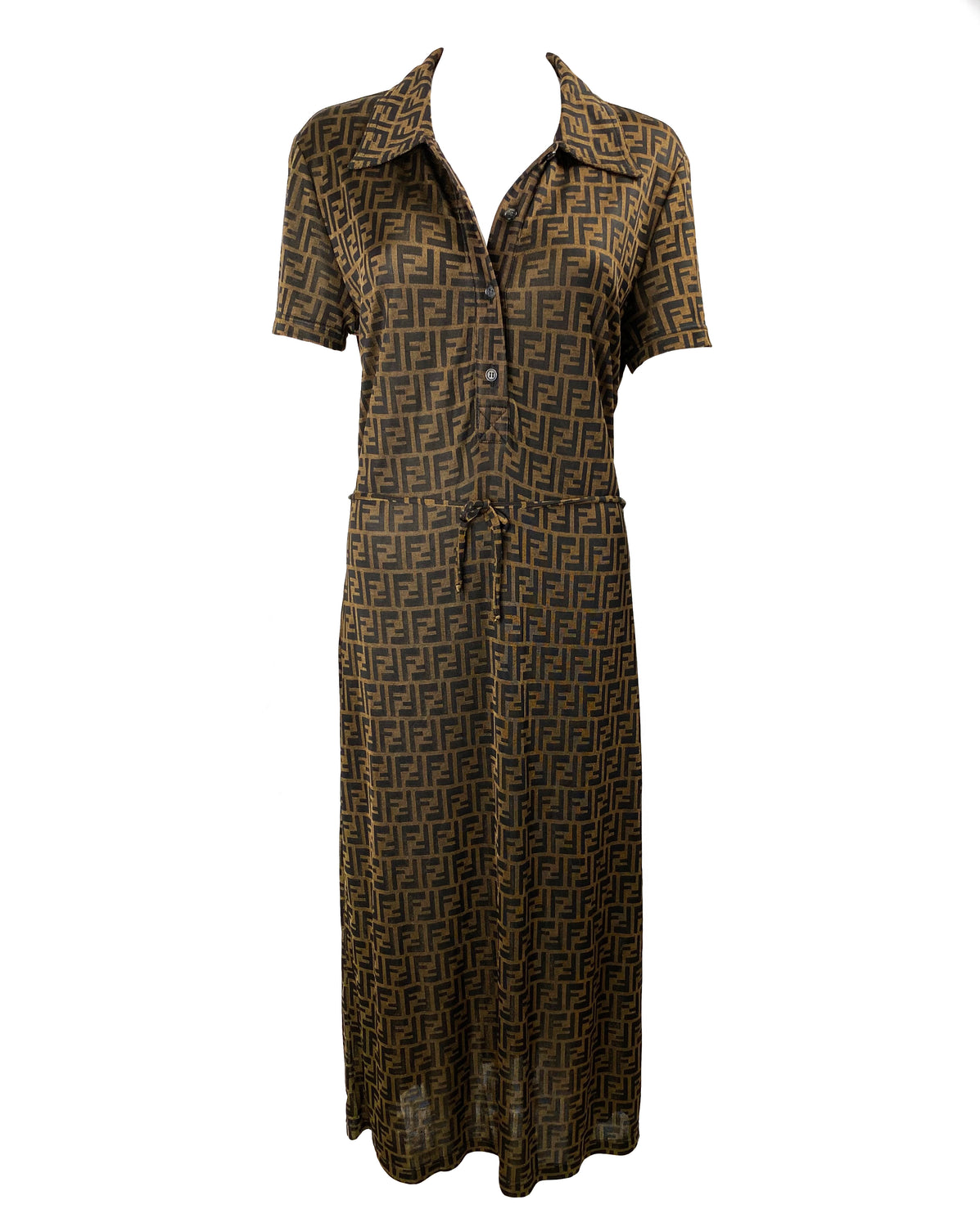 Fruit Vintage Fendi Zucca dress dating to the 90s it features a polo shirt dress cut, waist tie belt and a bold Fendi Zucca monogram logo print in black on brown.