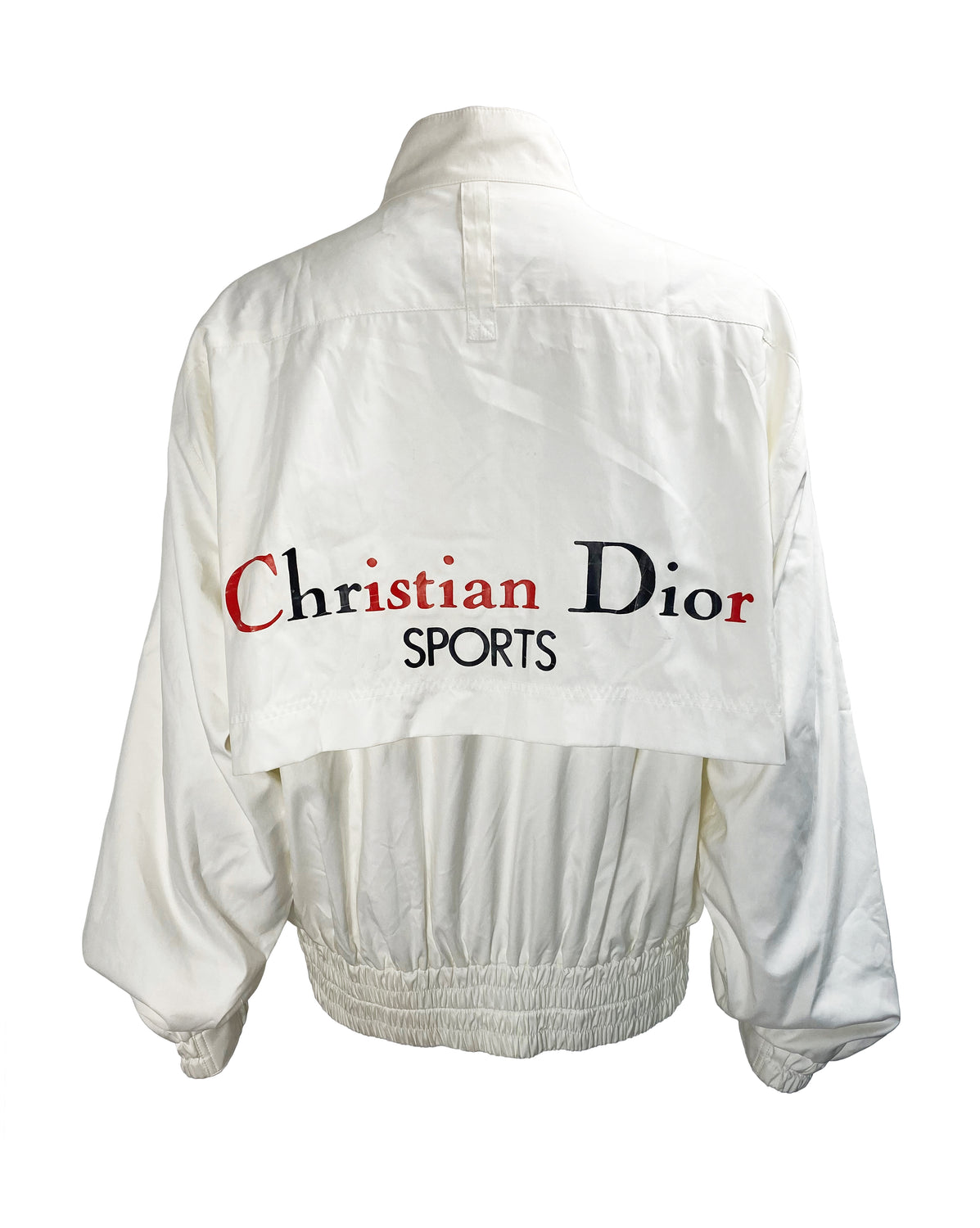 FRUIT Vintage  rare Christian Dior Sport Logo bomber jacket from the 1980s. It features a classic 1980s bomber jacket cut with over flap and large Christian Dior Sport text logo printed at rear.