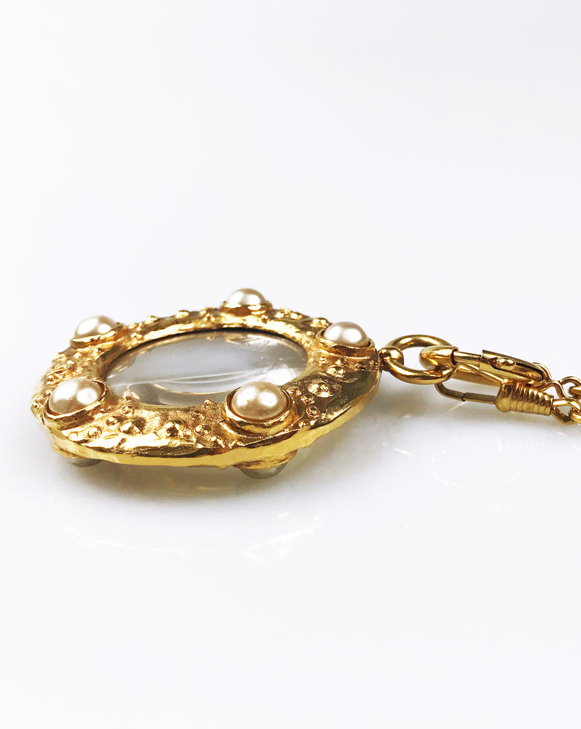 Fruit Vintage Chanel rare 1980s Gold Pearl Loupe Eyeglass Pendant with textured logo.