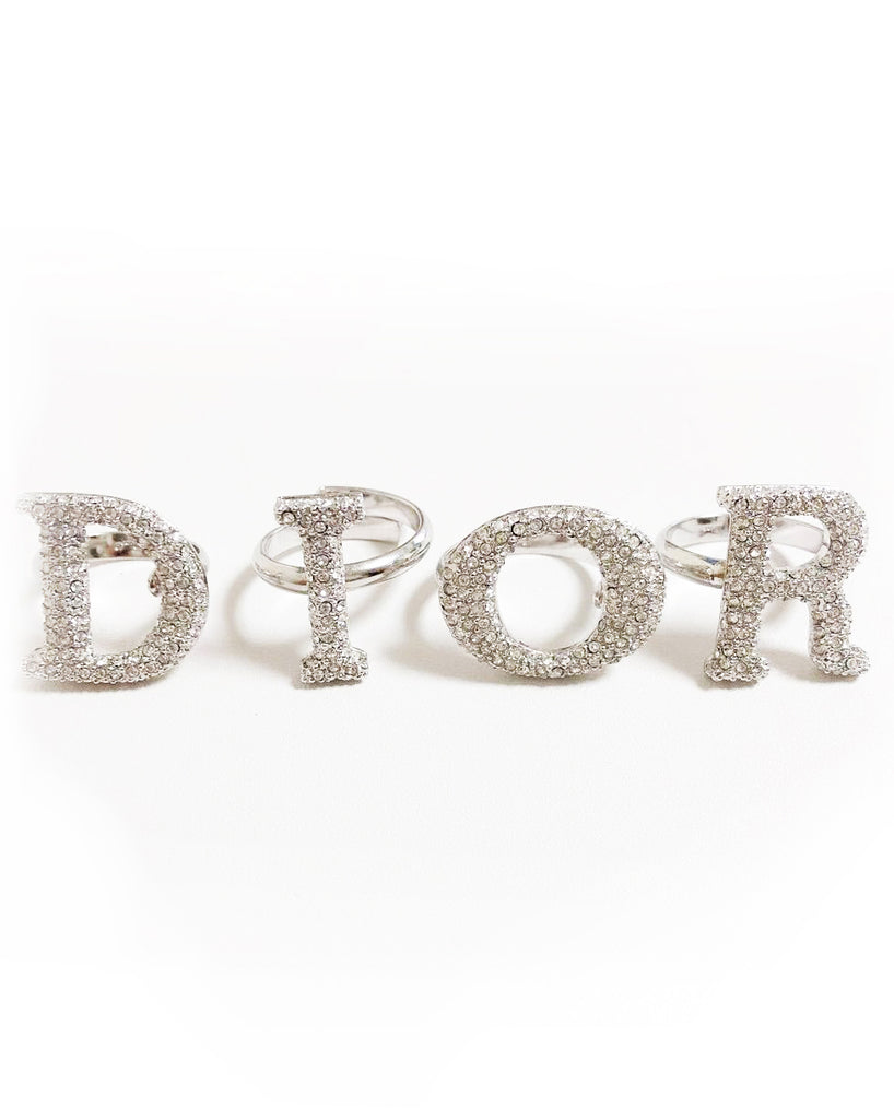 Fruit Vintage large Christian Dior diamonte crystal silver logo ring set as worn by Carrie Bradshaw on Sex and The City and Lady Gaga. Each letter is designed to be worn on a separate finger in the style of knuckle dusters.