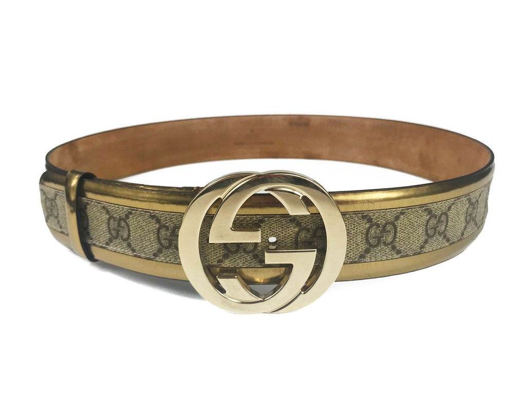 FRUIT Vintage Gucci 1990s logo belt featuring gold leather trim, classic Gucci coated canvas and a large Gucci double G buckle at the front.