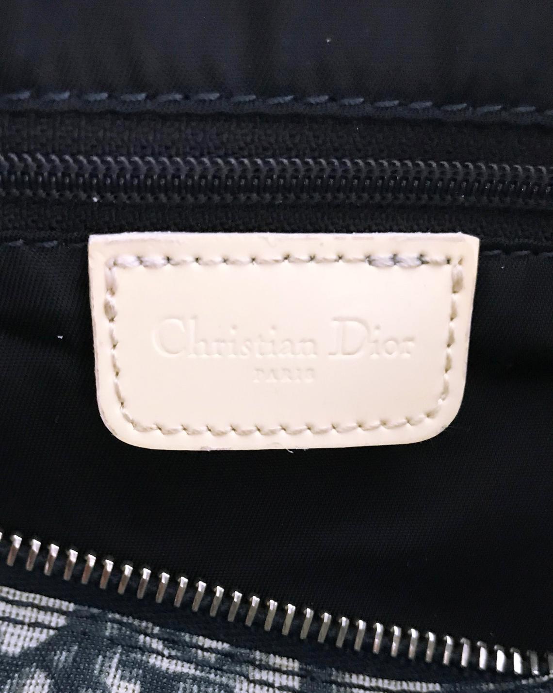 FRUIT vintage iconic Christian Dior by John Galliano navy coated monogram oblique canvas trotter bag with the famous number and racing stripe detailing at front.