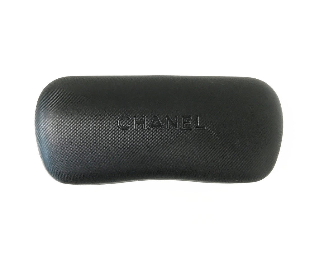 Fruit Vintage Chanel large Y2K logo sunglasses. They feature big Chanel CC logo monograms to each side and a classic early 2000s shield shape.