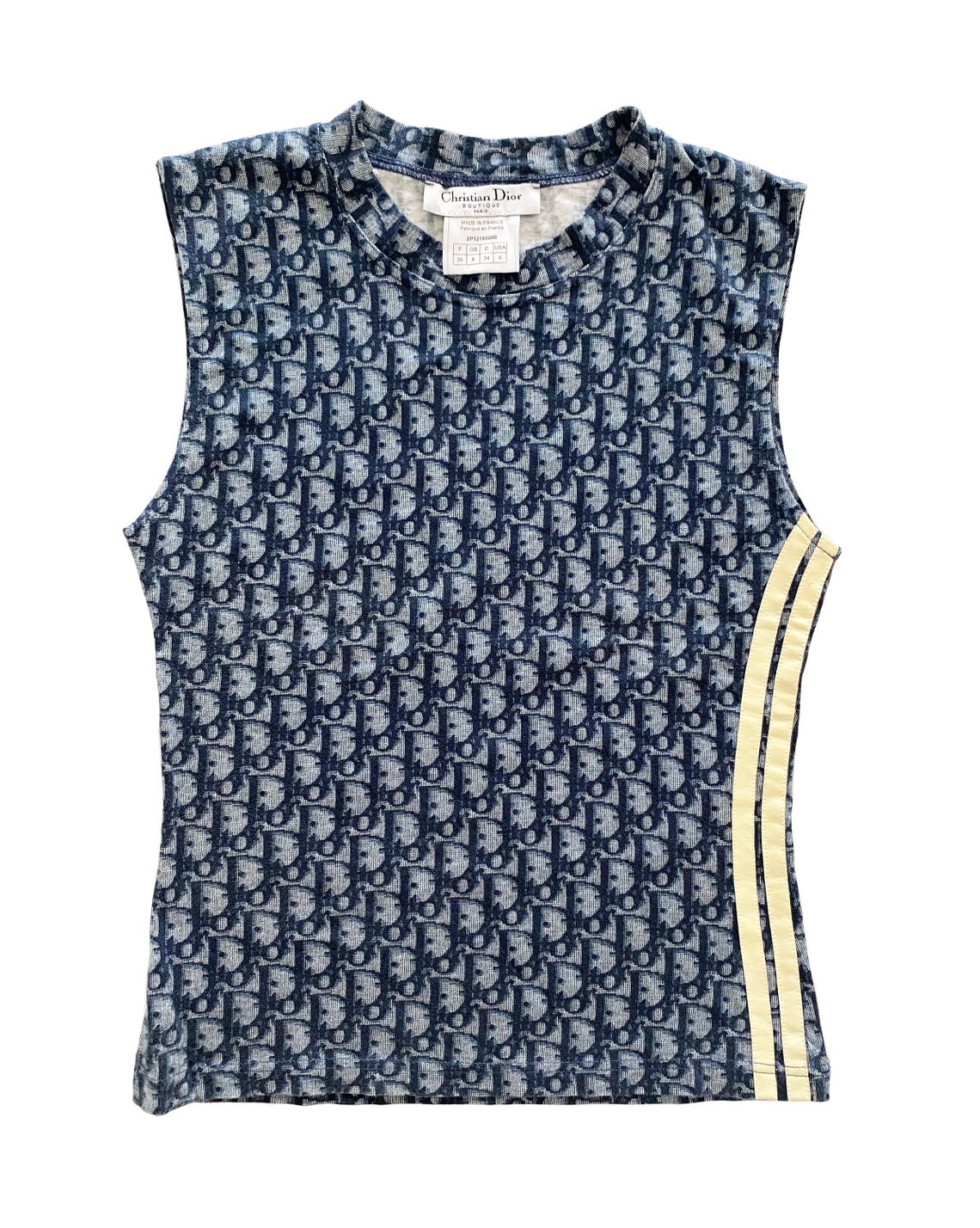 Fruit Vintage Christian Dior logo tank is about as iconic as it gets. Inspired by the original Dior monogram canvas luggage and accessories, and re-released under the creative direction of John Galliano, this tank top is a collectors dream.