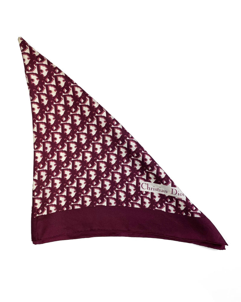 Fruit Vintage Christian Dior oblique print silk scarf in deep red/maroon. Features a bold graphic Dior logo print and hand finished rolled hem edging.