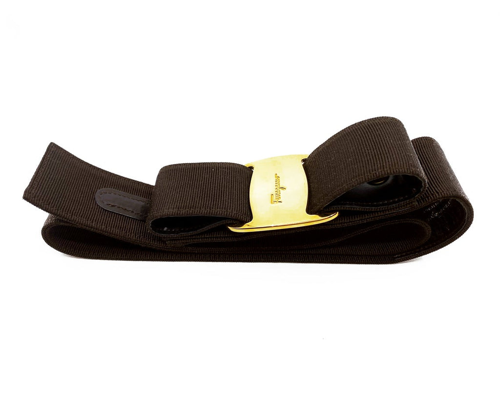 Fruit Vintage Salvatore Ferragamo 1980s bow belt in dark brown gross grain fabric. It features the iconic Ferragamo bow design with a large logo plate at front.