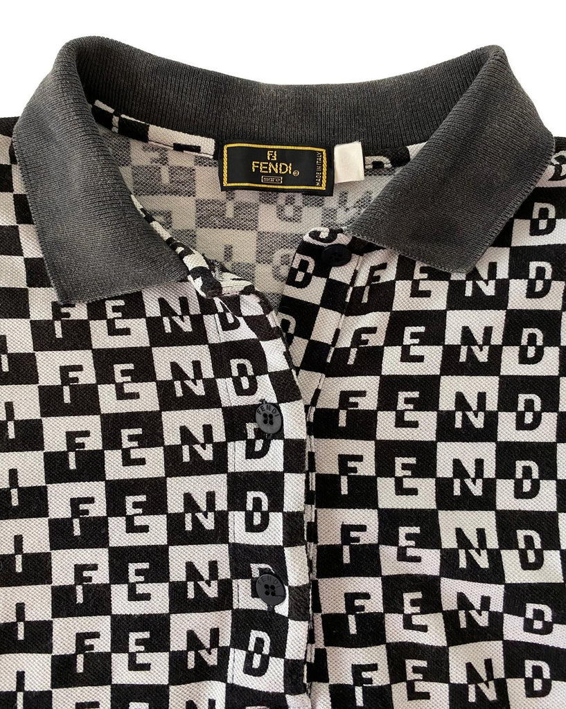 Fruit Vintage Fendi logo dress dating to the 90s, it features a polo shirt dress cut and a bold Fendi Logo print in black and white.