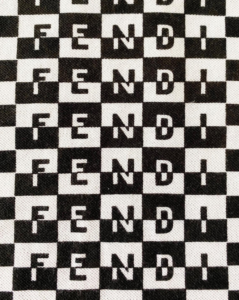 Fruit Vintage Fendi logo dress dating to the 90s, it features a polo shirt dress cut and a bold Fendi Logo print in black and white.