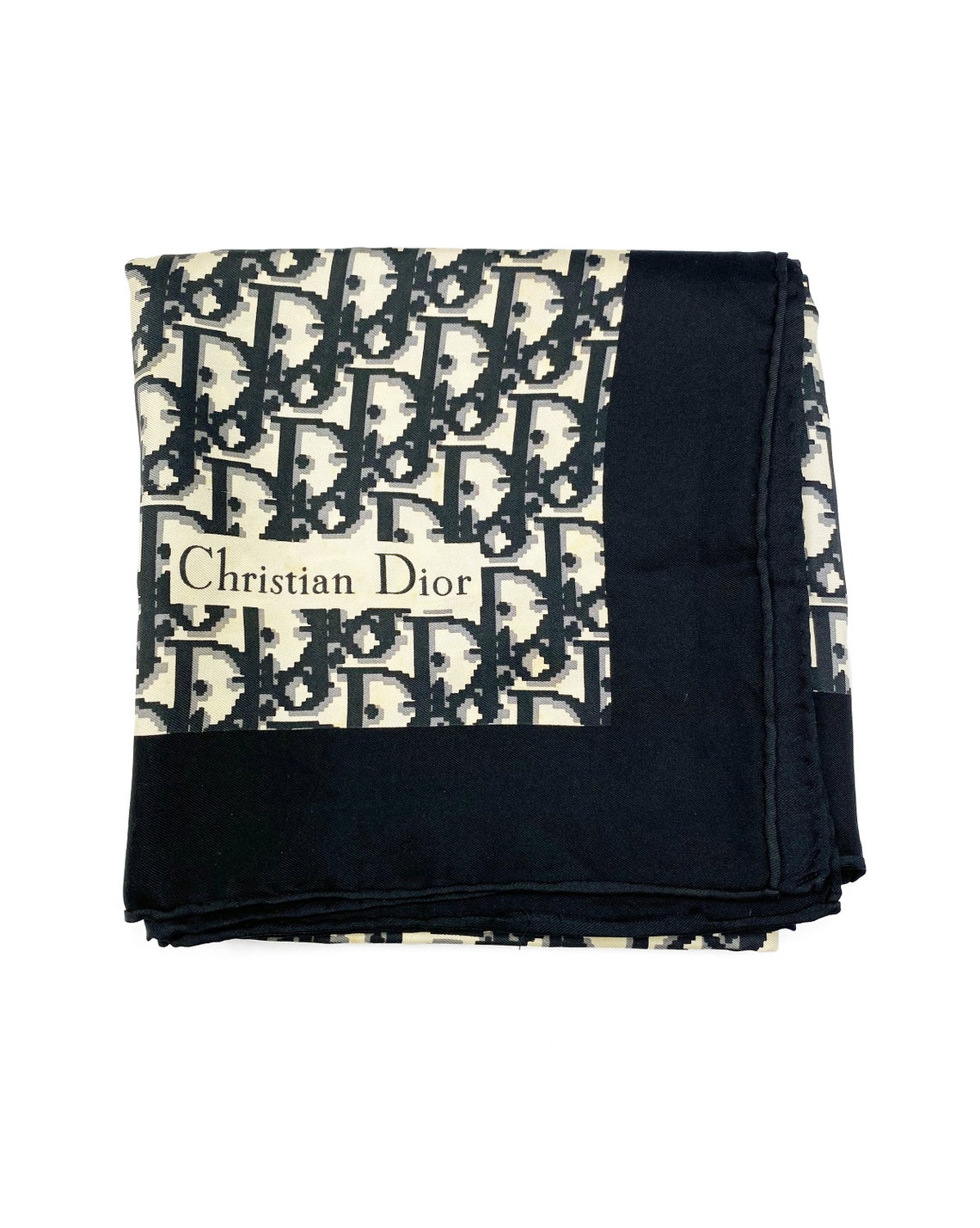 Fruit Vintage Christian Dior oblique print silk scarf in black and grey. Features a bold graphic Dior logo print and hand finished rolled hem edging.