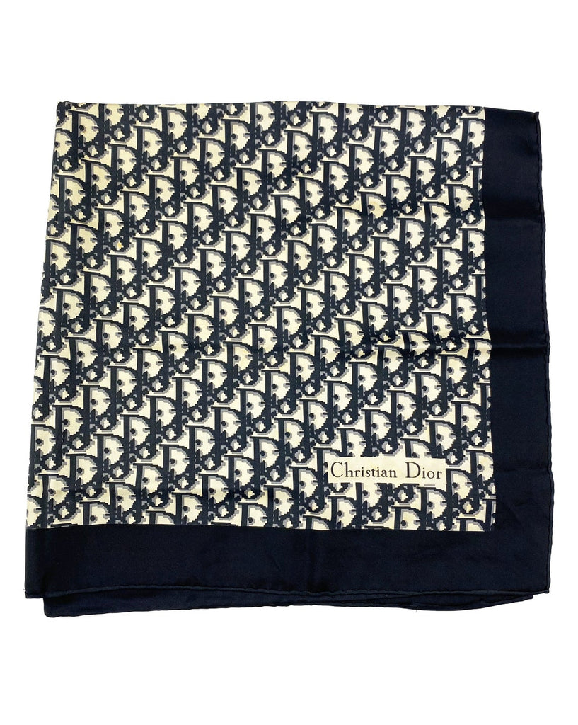 Fruit Vintage Christian Dior oblique print silk scarf in black and grey. Features a bold graphic Dior logo print and hand finished rolled hem edging.