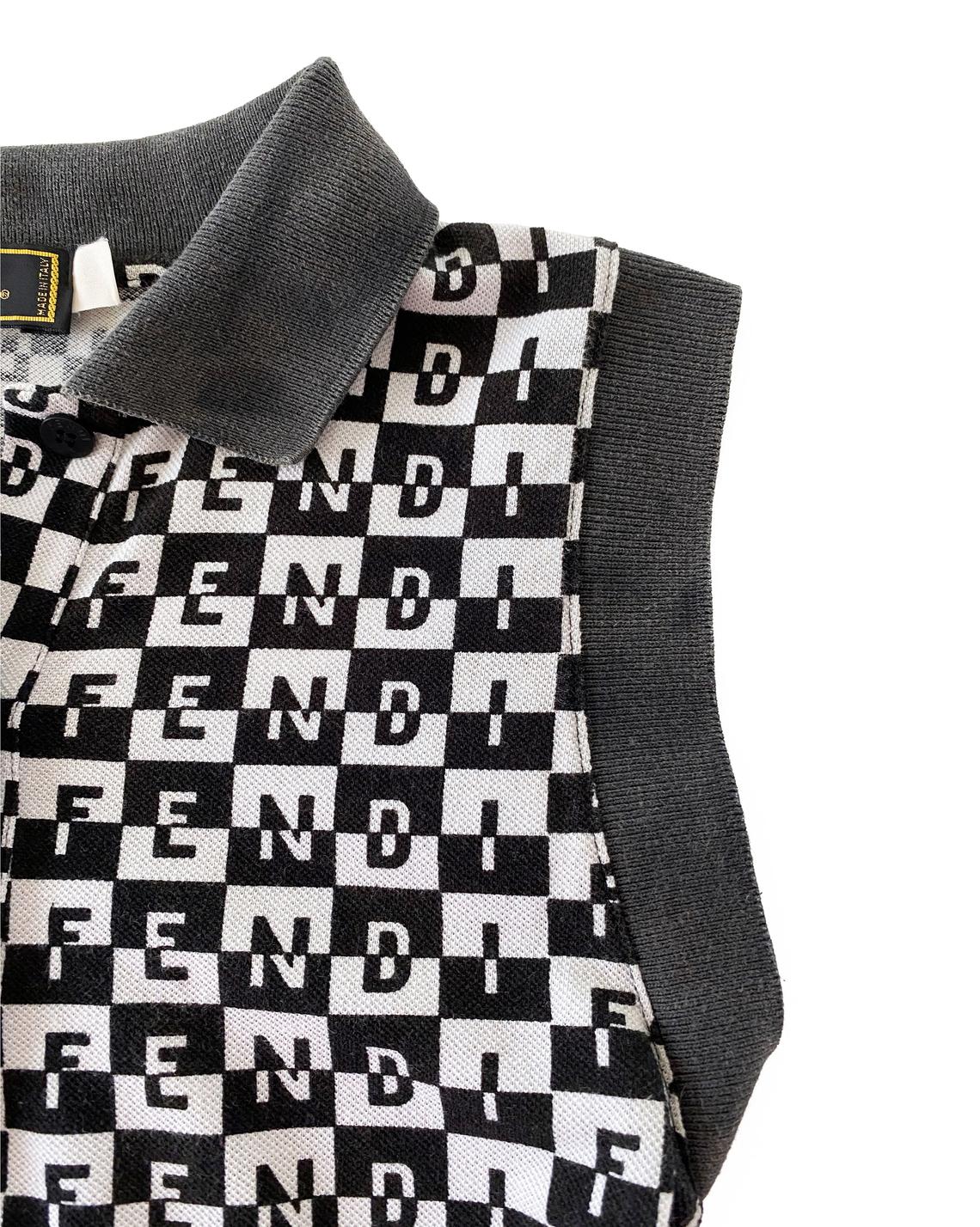 Fruit Vintage Fendi logo dress dating to the 90s, it features a polo shirt dress cut and a bold Fendi Logo print in black and white.