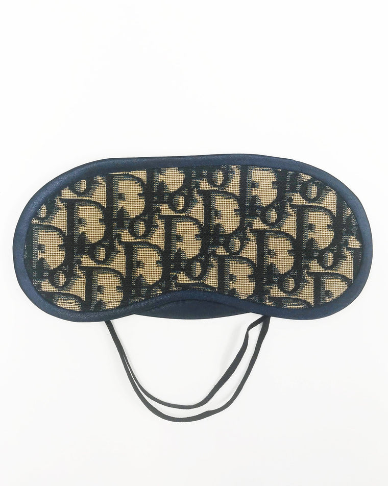 FRUIT vintage Christian Dior navy monogram logo eye mask and case set in mint/unused condition, dating to the 1980s. Features the classic Christian Dior trotter/oblique print all over and satin trim.