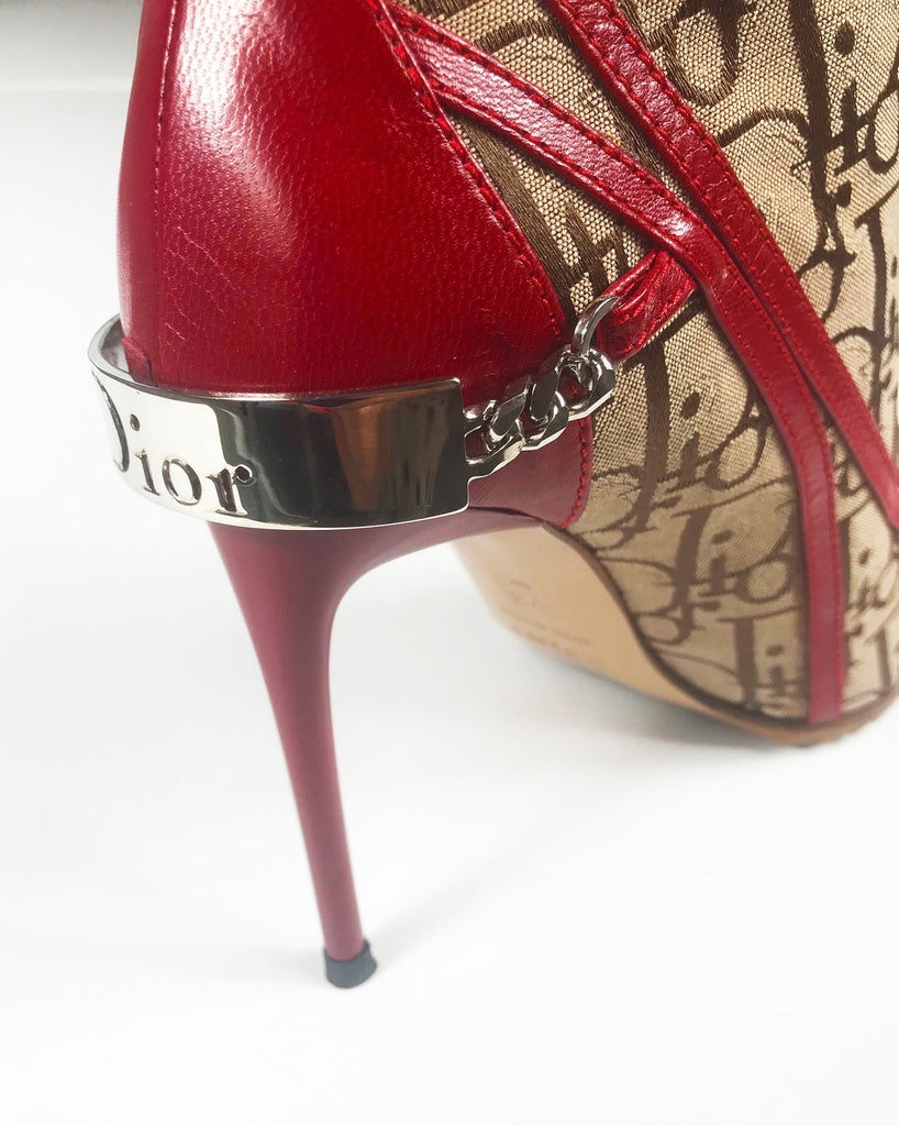 Fruit Vintage Christian Dior Rasta ankle boots, trotter monogram logo booties. Designed by John Galliano, they feature oblique logo print, lace up closure with leather laces, red leather trim and a large silver logo plate at rear.