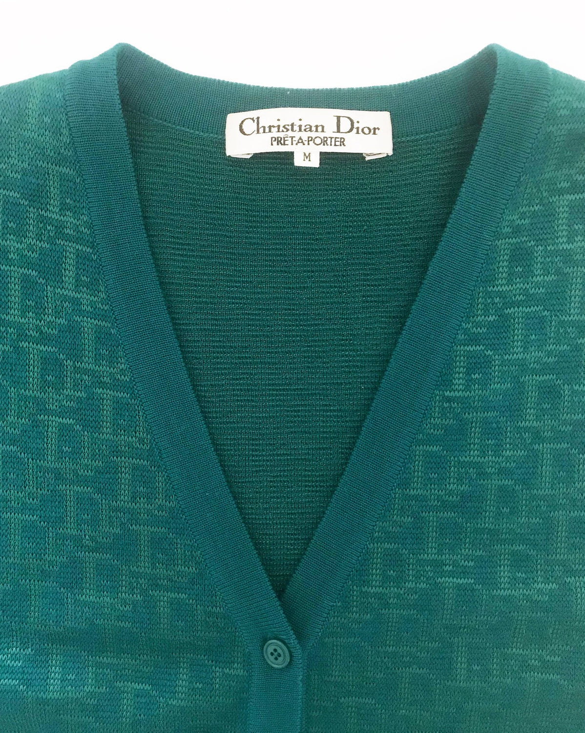 Fruit Vintage Christian Dior Christian Dior logo trotter knit cardigan in vibrant green. Features a classic cardigan cut with front pockets and button up closure.