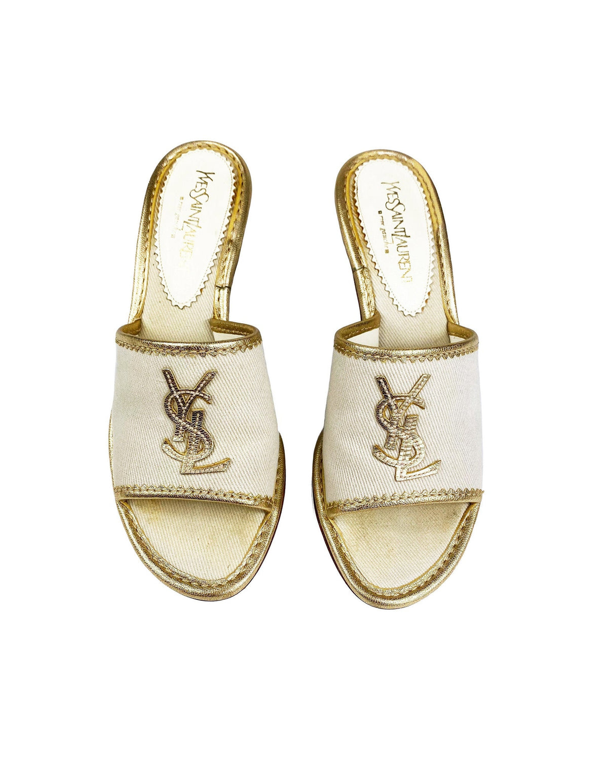 FRUIT Vintage Yves Saint Laurent logo canvas mules with gold leather trim. Features a a large gold leather YSL logo at front and stacked wooden heels.