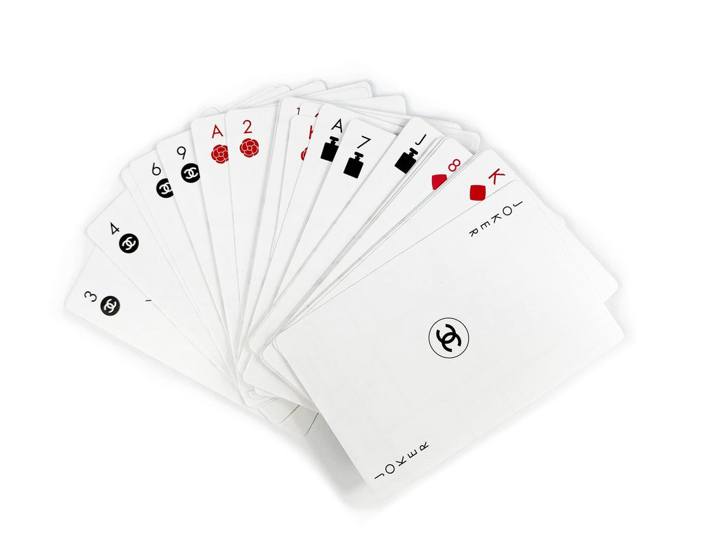 FRUIT Vintage Chanel logo printed playing card deck VIP gift set. Each of the different card numbers features a different iconic Chanel symbol (such as perfume bottles, camellias and the classic logos).