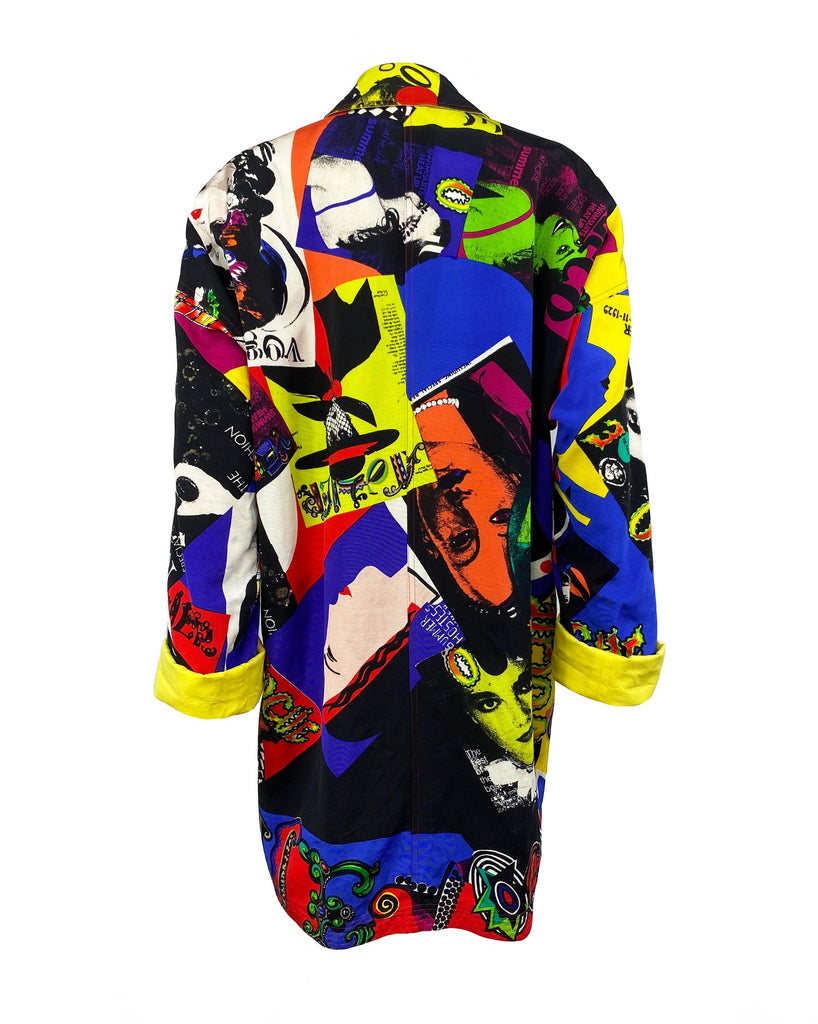 FRUIT Vintage Gianni Versace Vogue print coat from the iconic Spring 1991 runway collection. It features the iconic Vogue print in large scale all over and is fully reversible with a yellow cotton lining. This coat is a true piece of fashion history!