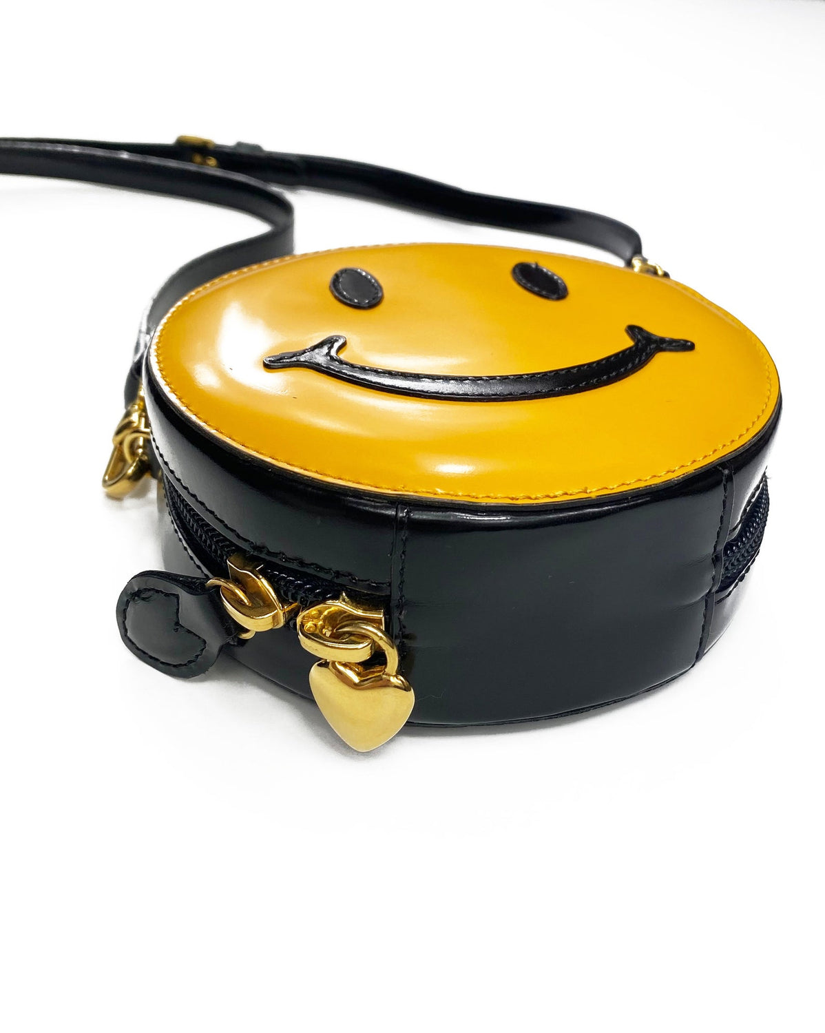 FRUIT Vintage Moschino Smiley Face Bag with cross body strap. Rare 1990s iconic Moschino mini yellow face logo handbag.