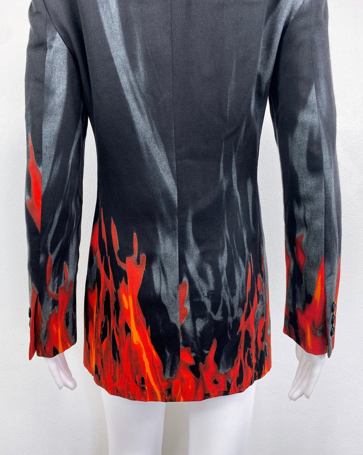 FRUIT Vintage Moschino 90s Flame Jacket as worn by Fran Drescher on the Nanny! It features a flame and smoke print on the hem line and sleeves going up the jacket. 