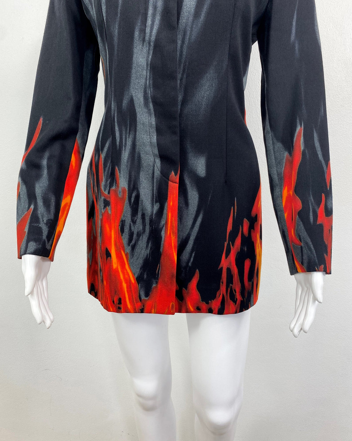 FRUIT Vintage Moschino 90s Flame Jacket as worn by Fran Drescher on the Nanny! It features a flame and smoke print on the hem line and sleeves going up the jacket. 