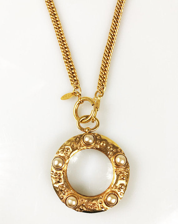 Fruit Vintage Chanel rare 1980s Gold Pearl Loupe Eyeglass Pendant with textured logo.