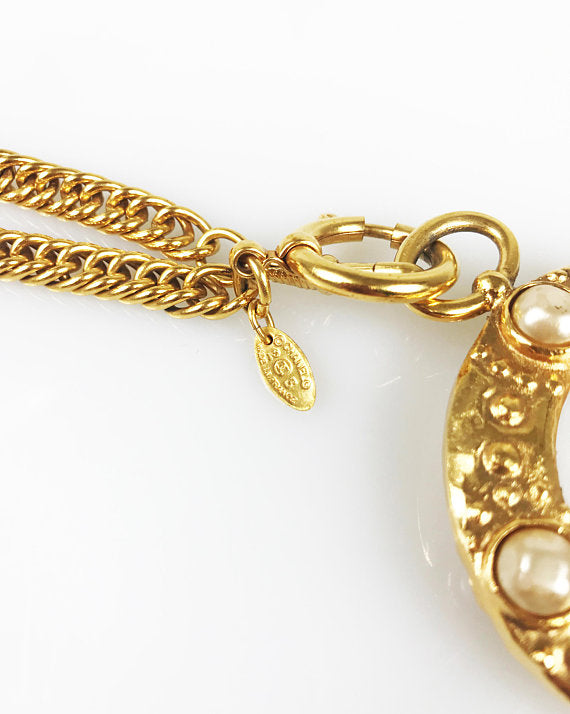 Fruit Vintage Chanel rare 1980s Gold Pearl Loupe Eyeglass Pendant with textured logo.