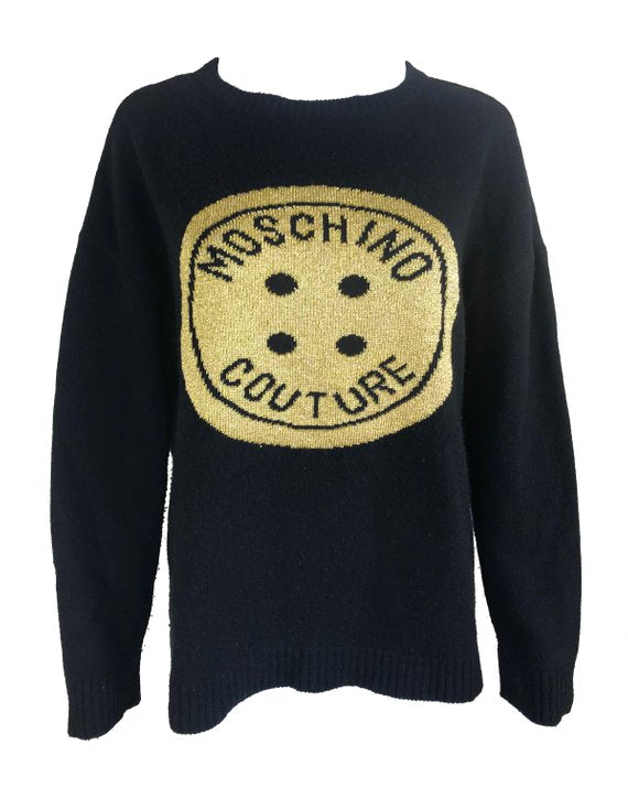 FRUIT Vintage Moschino Couture knit sweater from the 1990s. This amazing piece is made from a super soft wool/cashmere blend with an large intarsia style knitted gold front Moschino monogram logo