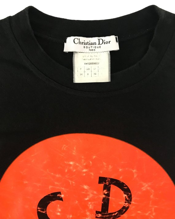 Fruit Vintage Christian Dior Smiley face logo tee printed with a neon orange smiley face with CD logo eyes.