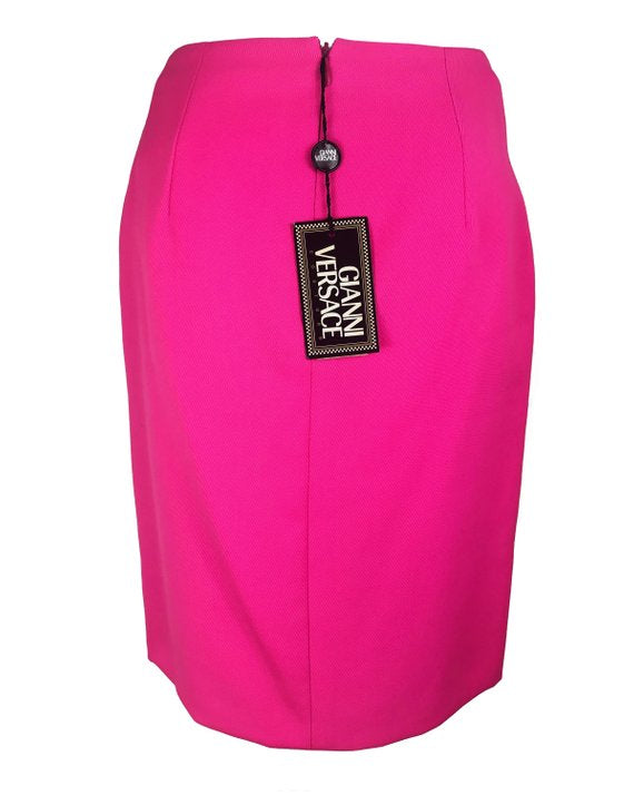 FRUIT Vintage neon pink lifetime Gianni Versace skirt with the original tags still attached. This piece dates to 1996 and features a classic slim fit and high waist design. 