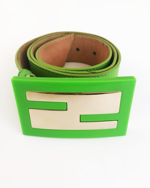 FRUIT Vintage Fendi Zucca Monogram Logo belt. It features a large Fendi logo buckle made from brass and perspex in awesome neon green.