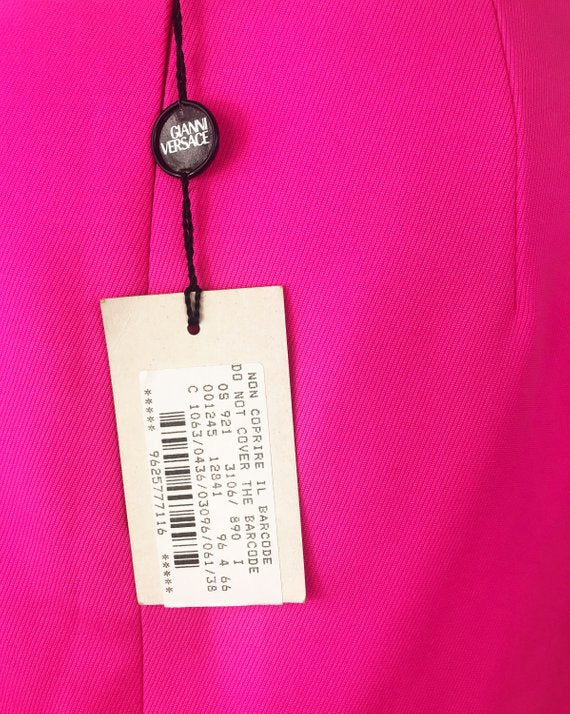 FRUIT Vintage neon pink lifetime Gianni Versace skirt with the original tags still attached. This piece dates to 1996 and features a classic slim fit and high waist design. 