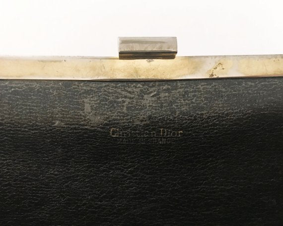 FRUIT vintage 1970s Christian Dior clutch bag is made of Brown oblique monogram logo trotter print canvas and features a gold hardware clip top closure. 