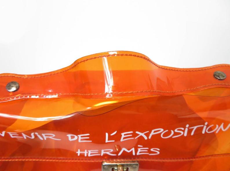 Fruit Vintage Souvenir Hermes Clear orange Kelly bag dating to 1998. Originally sold by Hermes as a very limited edition souvenir piece to celebrate the opening of a special Hermes boutique in Japan in 1998, these are highly collectable as seen on Ariana Grande and Kim Kardashian.