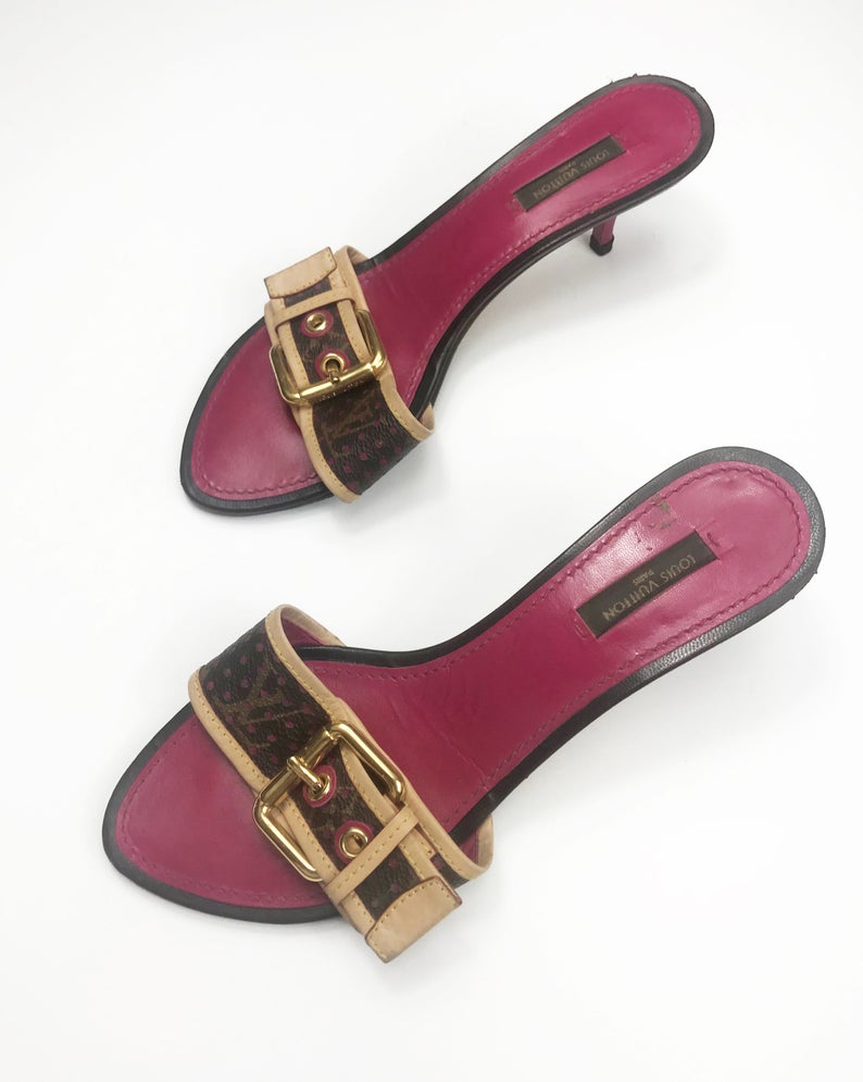 FRUIT Vintage Louis Vuitton kitten heels monogram canvas mules with logo buckles. Feature a perforated logo canvas with pink trim and classic tan leather.