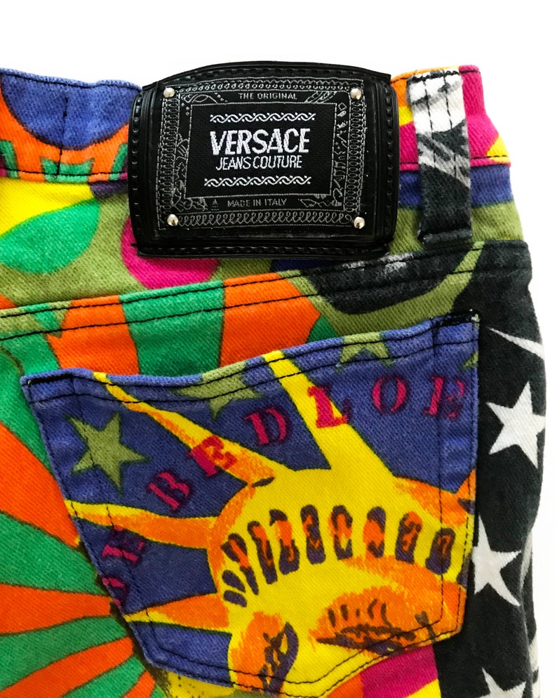 FRUIT Vintage Versace Jeans Couture 'Manhattan New York City' Print Jeans Pants by Gianni Versace piece from the 1990s.