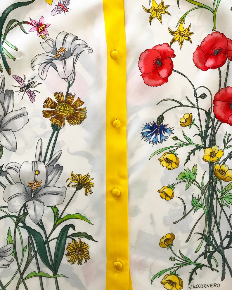 FRUIT vintage rare Gucci silk flora print shirt dating to the 1980s. It features the classic Gucci flora design from the era trimmed with vibrant yellow. This is a true piece of Gucci history!