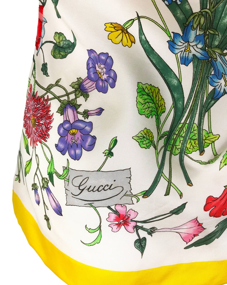 FRUIT vintage rare Gucci silk flora print shirt dating to the 1980s. It features the classic Gucci flora design from the era trimmed with vibrant yellow. This is a true piece of Gucci history!