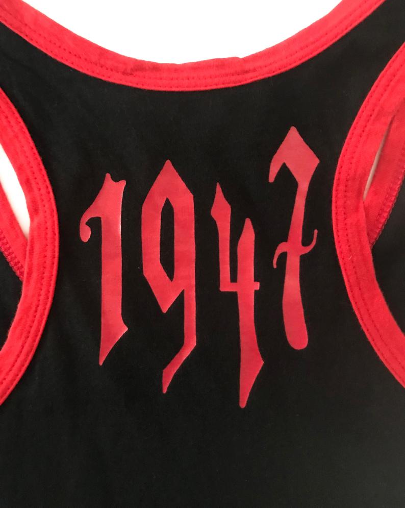 Fruit Vintage Christian Dior tank designed by John Galliano with Gothic text Logo. Features a classic racer tank cut and graphic print with Christian Dior across the front and 1947 across the back