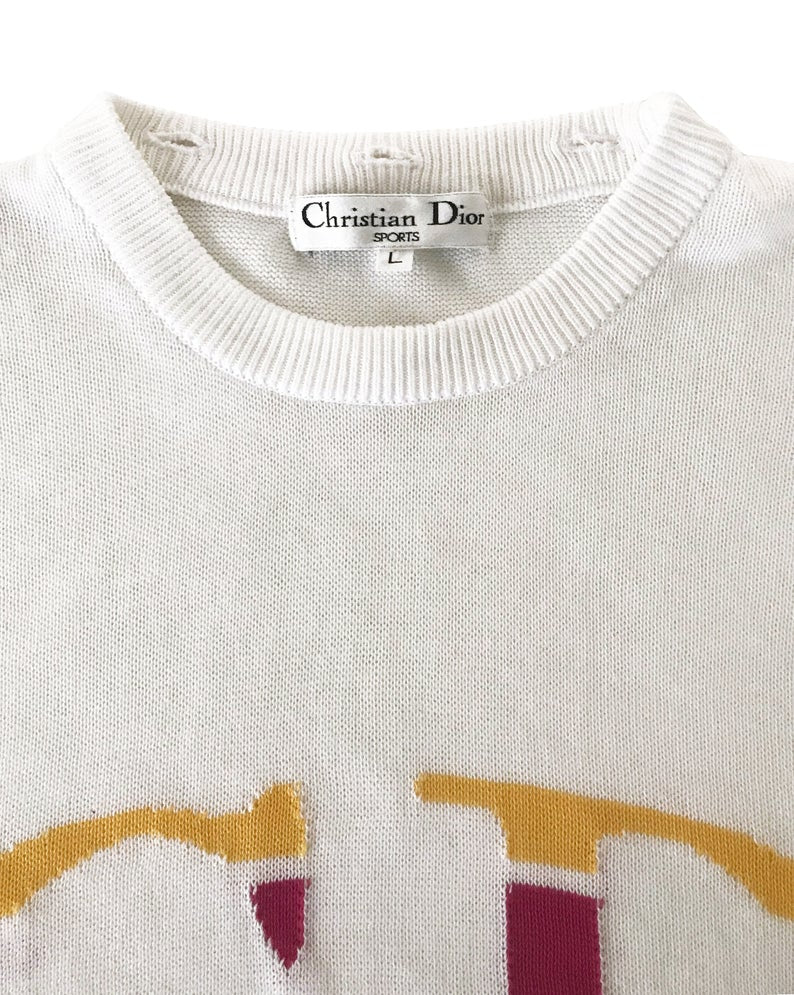 Fruit Vintage Christian Dior Sport CD sweat shirt from the 1980s. It features an large embroidered CD logo at front woven intarsia style into the knit fabric and a removable polo collar