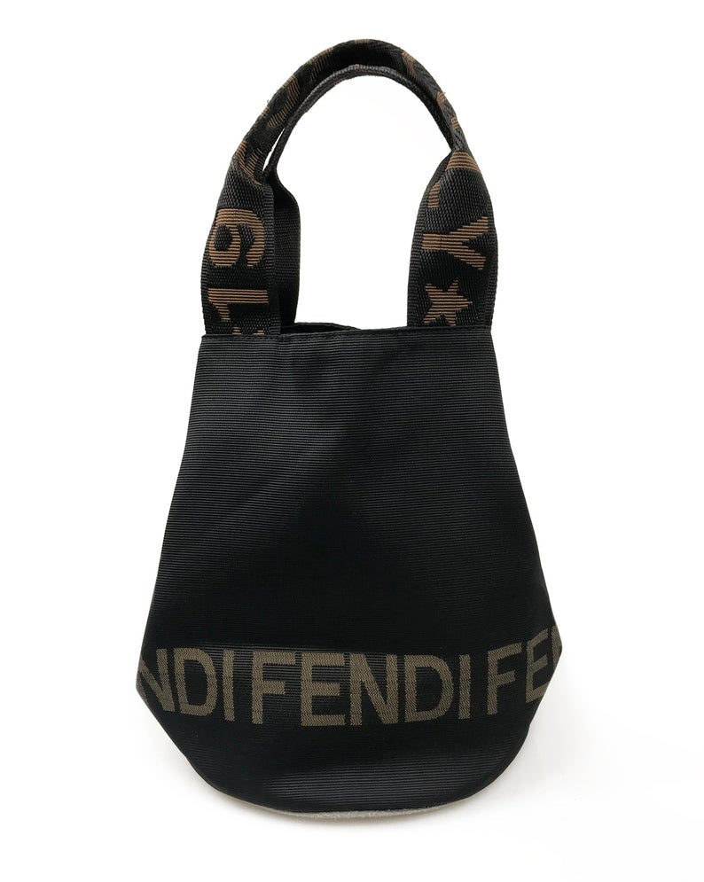 FRUIT Vintage Fendi Zucca small logo tote bag in durable nylon canvas. It features Fendi logo text at the front, monogram handles and internal seam trim, and top zipper closure. The bag can be buttoned to change shape into a more bucket shape also!