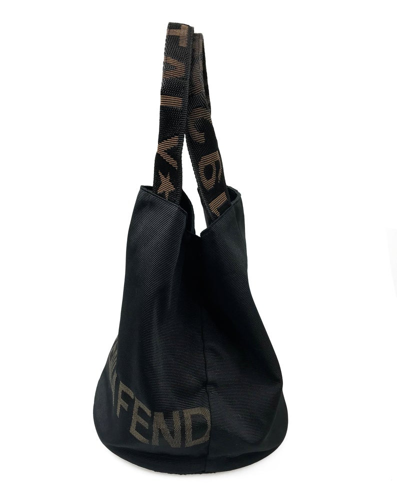 FRUIT Vintage Fendi Zucca small logo tote bag in durable nylon canvas. It features Fendi logo text at the front, monogram handles and internal seam trim, and top zipper closure. The bag can be buttoned to change shape into a more bucket shape also!