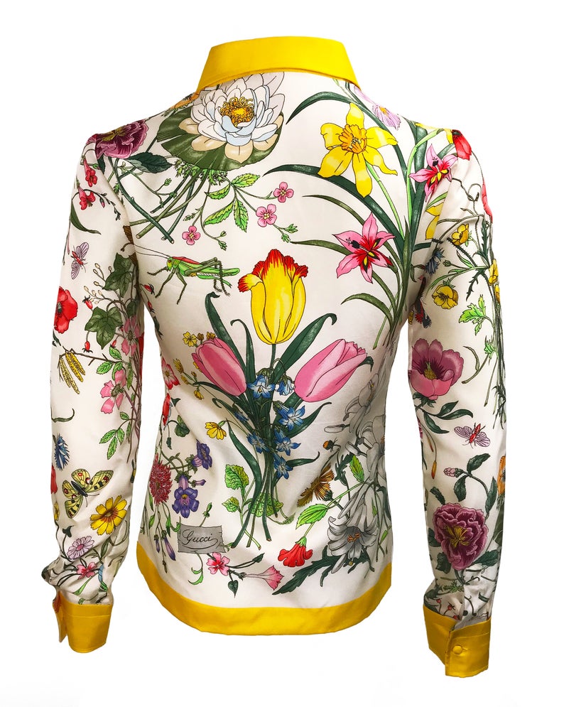 FRUIT vintage rare Gucci silk flora print shirt dating to the 1980s. It features the classic Gucci flora design from the era trimmed with vibrant yellow. This is a true piece of Gucci history!