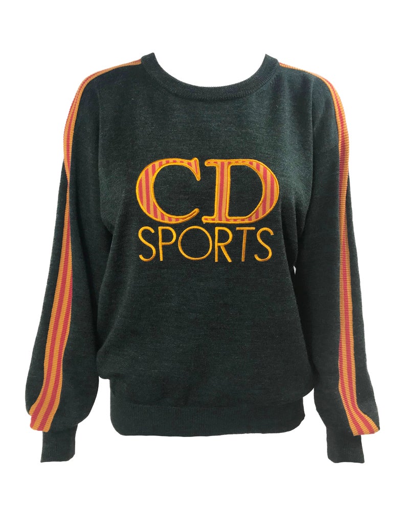 Fruit Vintage Christian Dior Sport CD sweat shirt from the 1980s. It features an large embroidered CD logo at front and ribbed fabric