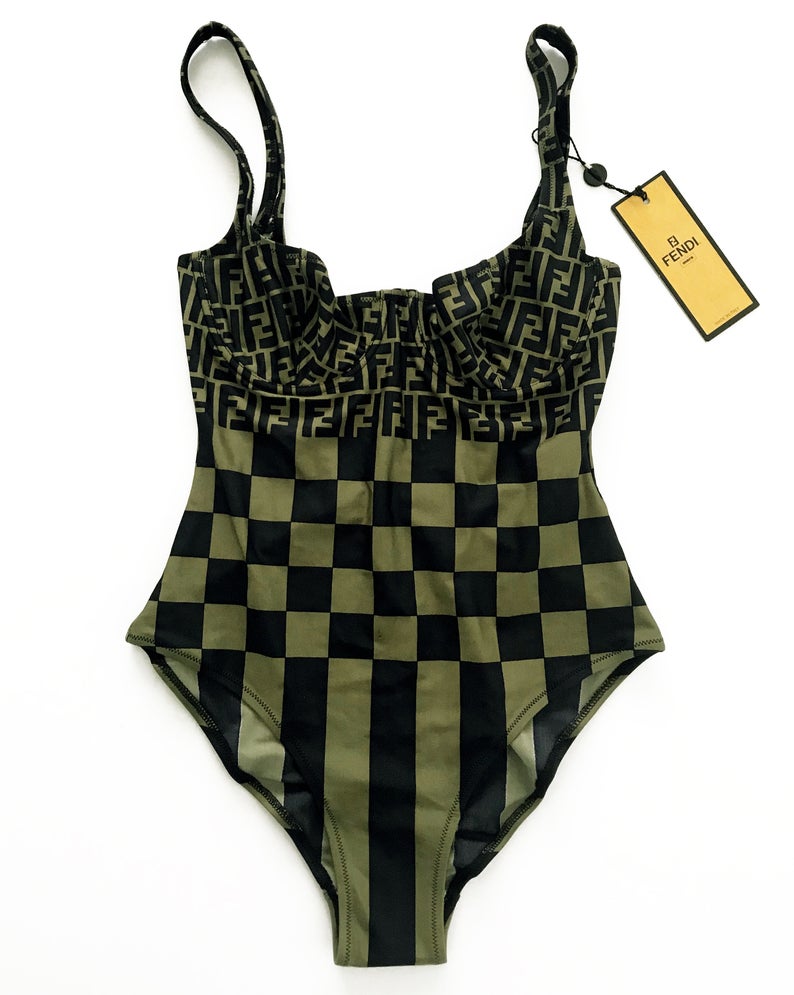 FRUIT vintage Mint condition Fendi Zucca print swimsuit from the 90s. This amazing monogram logo set is a collectors dream. Features a lingerie style bra top with the iconic Fendi logo monogram and Fendi checkerboard print design. This would also make an incredible bodysuit for day wear.