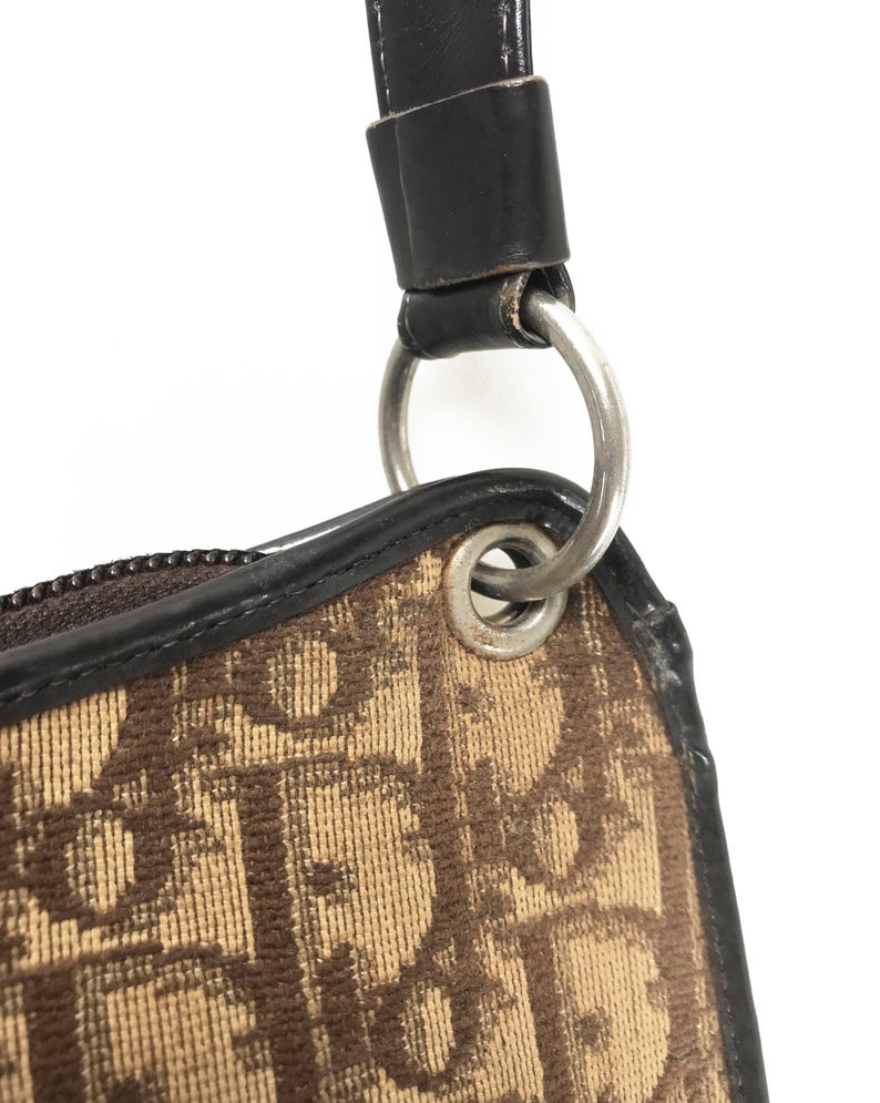 FRUIT vintage 1970s Christian Dior brown monogram canvas handbag. Features a simple 'hobo' style shape perfect for wear on the shoulder, gold CD logo at front, and simple zip top closure.