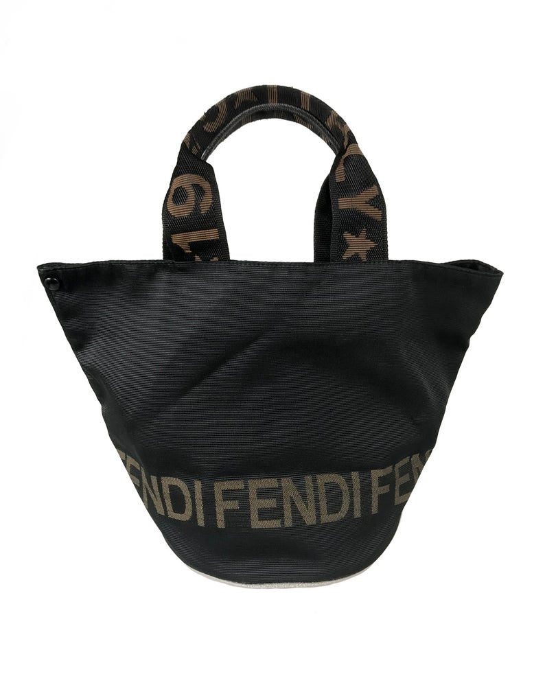 FRUIT Vintage Fendi Zucca small logo tote bag in durable nylon canvas. It features Fendi logo text at the front, monogram handles and internal seam trim, and top zipper closure. The bag can be buttoned to change shape into a more bucket shape also!